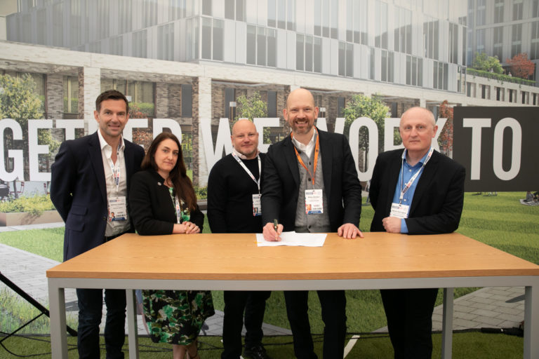 Caddick Group and Homes England sign agreement at UKREiiF